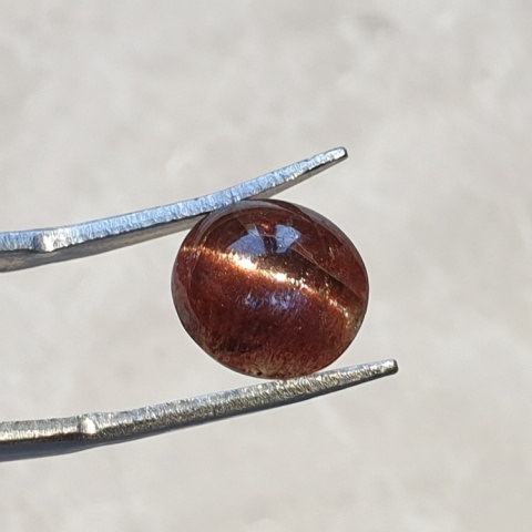 Skapolit kocie oko kaboszon 31x10 mm nr 49