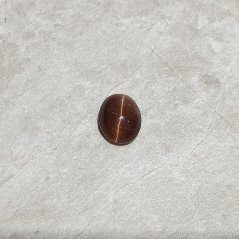 Scapolite cat's eye cabochon 9x7 mm no 272