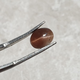 Skapolit kocie oko kaboszon 9x7 mm nr 272