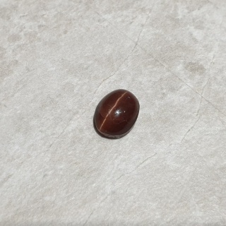 Skapolit kocie oko kaboszon 9x7 mm nr 273