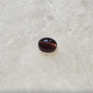 Skapolit kocie oko kaboszon 9x7 mm nr 92