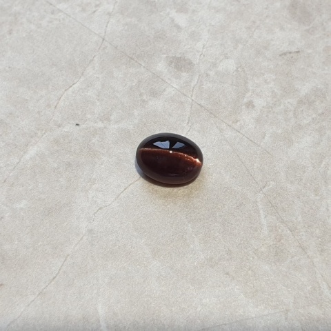 Skapolit kocie oko kaboszon 9x7 mm nr 92
