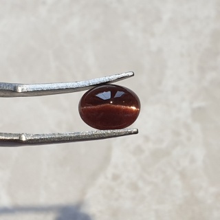 Skapolit kocie oko kaboszon 9x7 mm nr 92