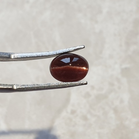 Skapolit kocie oko kaboszon 9x7 mm nr 92