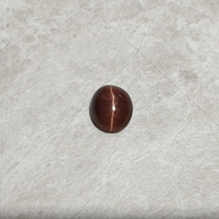 Skapolit kocie oko kaboszon 9x8 mm nr 253