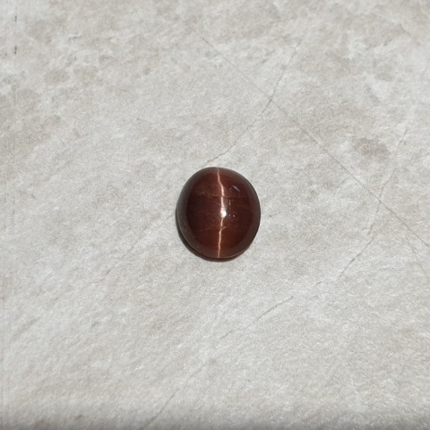 Scapolite cat's eye cabochon 9x8 mm no 253