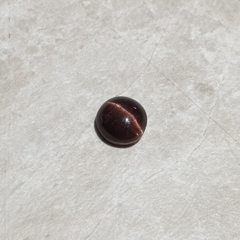 Scapolite cat's eye cabochon fi 9x mm no 271