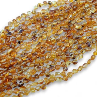 Bursztyn bałtycki bryłka 6-8 mm sznur 60 cm pomarańczowy