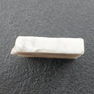 Howlit cięty surowy 23x21 mm nr 9