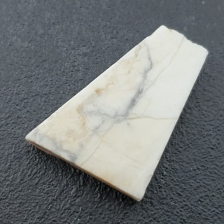 Howlit cięty surowy 31x22 mm nr 74