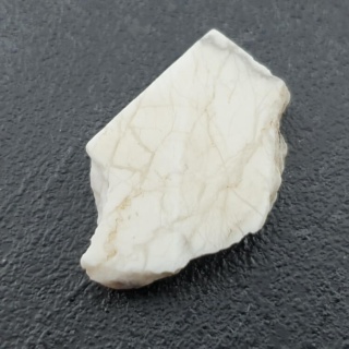 Howlit cięty surowy 28x18 mm nr 99