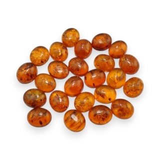 Bursztyn bałtycki kaboszon 10,5-11x9 mm 1 szt