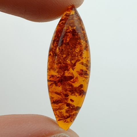 Bursztyn bałtycki kaboszon 28x10 mm nr A72
