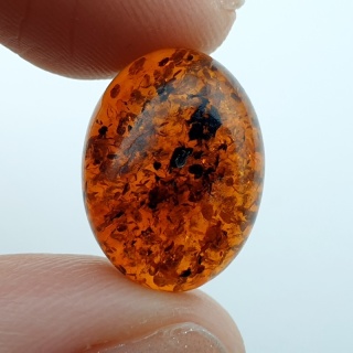 Bursztyn bałtycki kaboszon 16x12 mm nr A202
