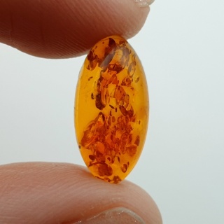 Bursztyn bałtycki kaboszon 16x8 mm nr A303