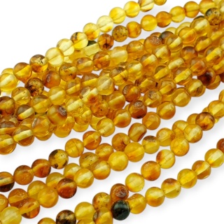 Bursztyn bałtycki koralik nieregularny około 5,35 mm sznur 19 cm