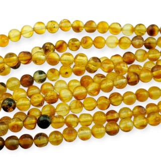 Bursztyn bałtycki koralik nieregularny około 5,35 mm sznur 19 cm