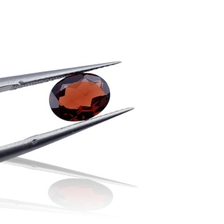 Garnet oval faceted 8x6mm 1 pc