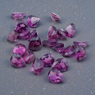 Rhodolite garnet teardrop faceted 5x4 mm 1 pc
