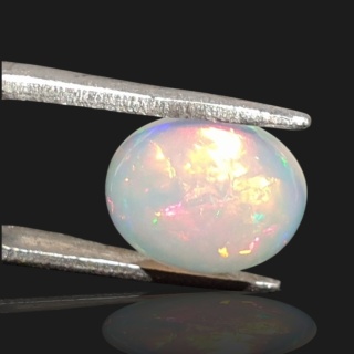 Opal z Etiopii kaboszon 11x9 mm nr 941