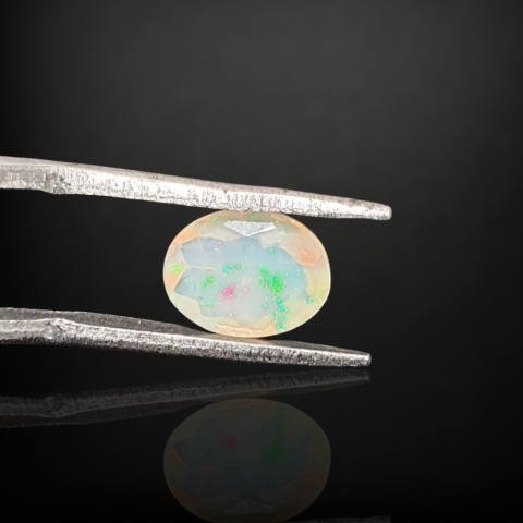 Ethiopian faceted opal 9x7 mm no A174