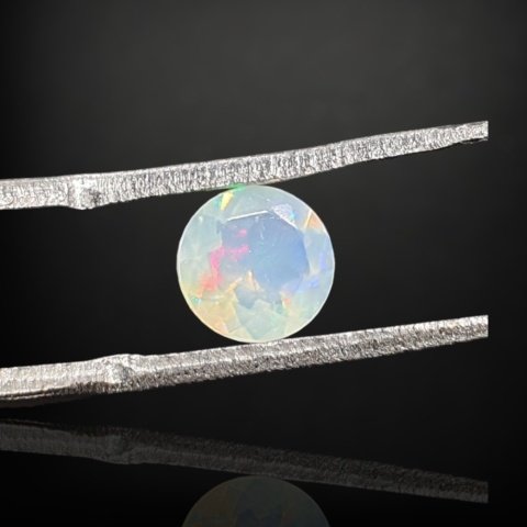 Ethiopian faceted opal fi 6 mm no A56