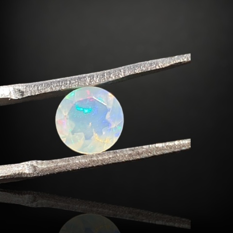 Ethiopian faceted opal fi 6 mm no A56