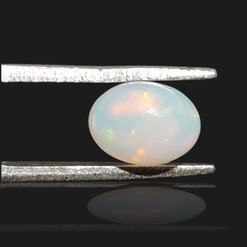 Ethiopian opal cabochon 8x6 mm no 954