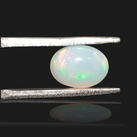 Ethiopian opal cabochon 8x6 mm no 954