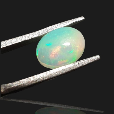 Ethiopian opal cabochon 8x6 mm no 958
