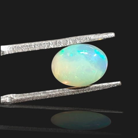 Ethiopian opal cabochon 8x6 mm no 958