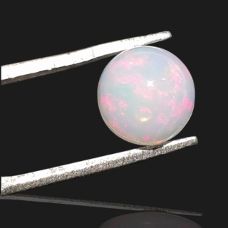 Opal z Etiopii kaboszon fi 8 mm nr 977