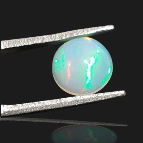 Ethiopian opal cabochon fi 8 mm no 979