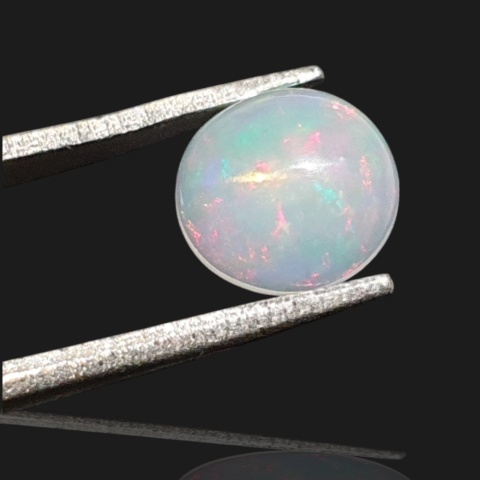 Ethiopian opal cabochon fi 8 mm no 990