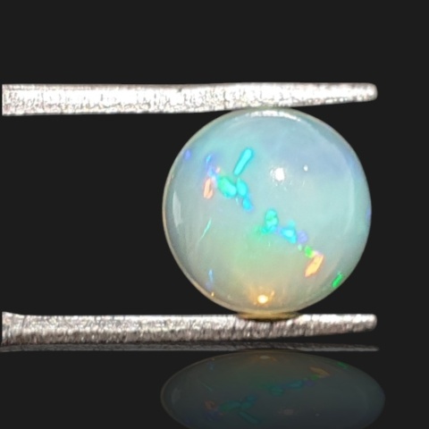 Ethiopian opal cabochon fi 9 mm no 962