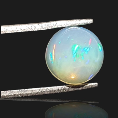 Ethiopian opal cabochon fi 9 mm no 962