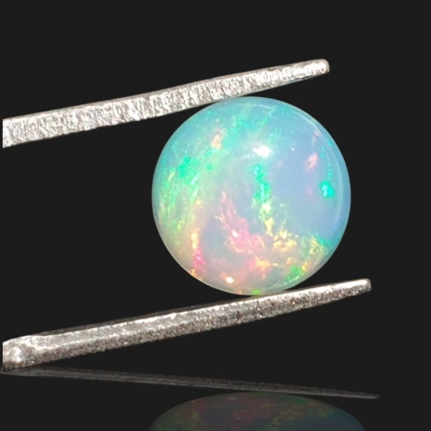 Ethiopian opal cabochon fi 9 mm no 966