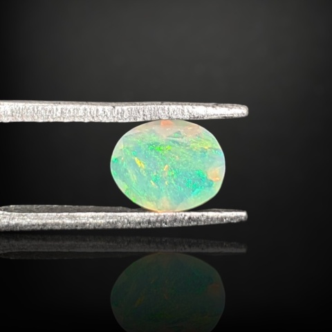 Ethiopian faceted opal 7x6 mm no A205