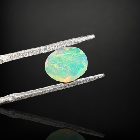 Ethiopian faceted opal 7x6 mm no A205