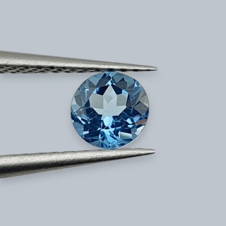 Topaz swiss blue fasetowany okrągły fi 4 mm nr 21