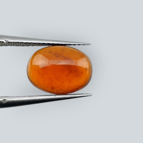Hessonite garnet cabochon 10x8 mm no 240