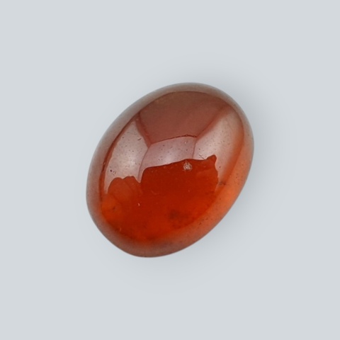 Hessonite garnet cabochon 11x9 mm no 152