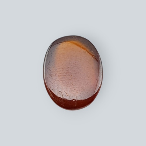 Hessonite garnet cabochon 11x9 mm no 152