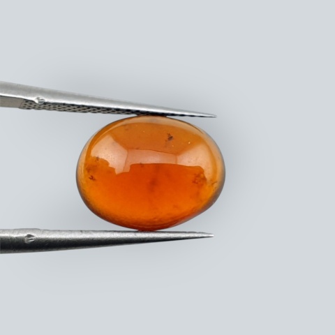 Granat Hessonit kaboszon 11x9 mm nr 93