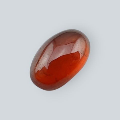 Granat Hessonit kaboszon 12x7 mm nr 201