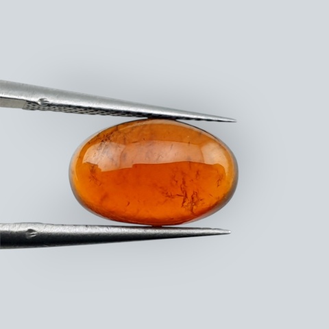 Granat Hessonit kaboszon 12x7 mm nr 201