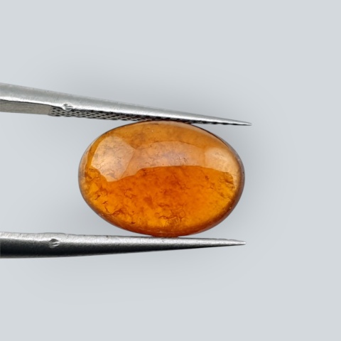 Hessonite garnet cabochon 12x8 mm no 165