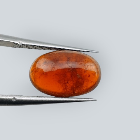 Hessonite garnet cabochon 12x8 mm no 208