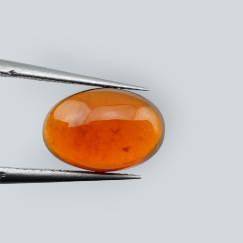 Hessonite garnet cabochon 12x8 mm no 221