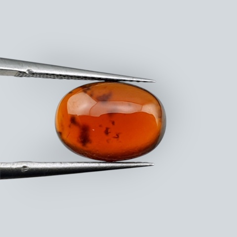 Granat Hessonit kaboszon 12x8 mm nr 54